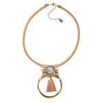 Necklace made of thick cord with satin fabric, metallic elements with crystal in milky white, rhinestones and leather tassel, in