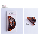 Hair clip with a length of 9cm in brown-tortoise color